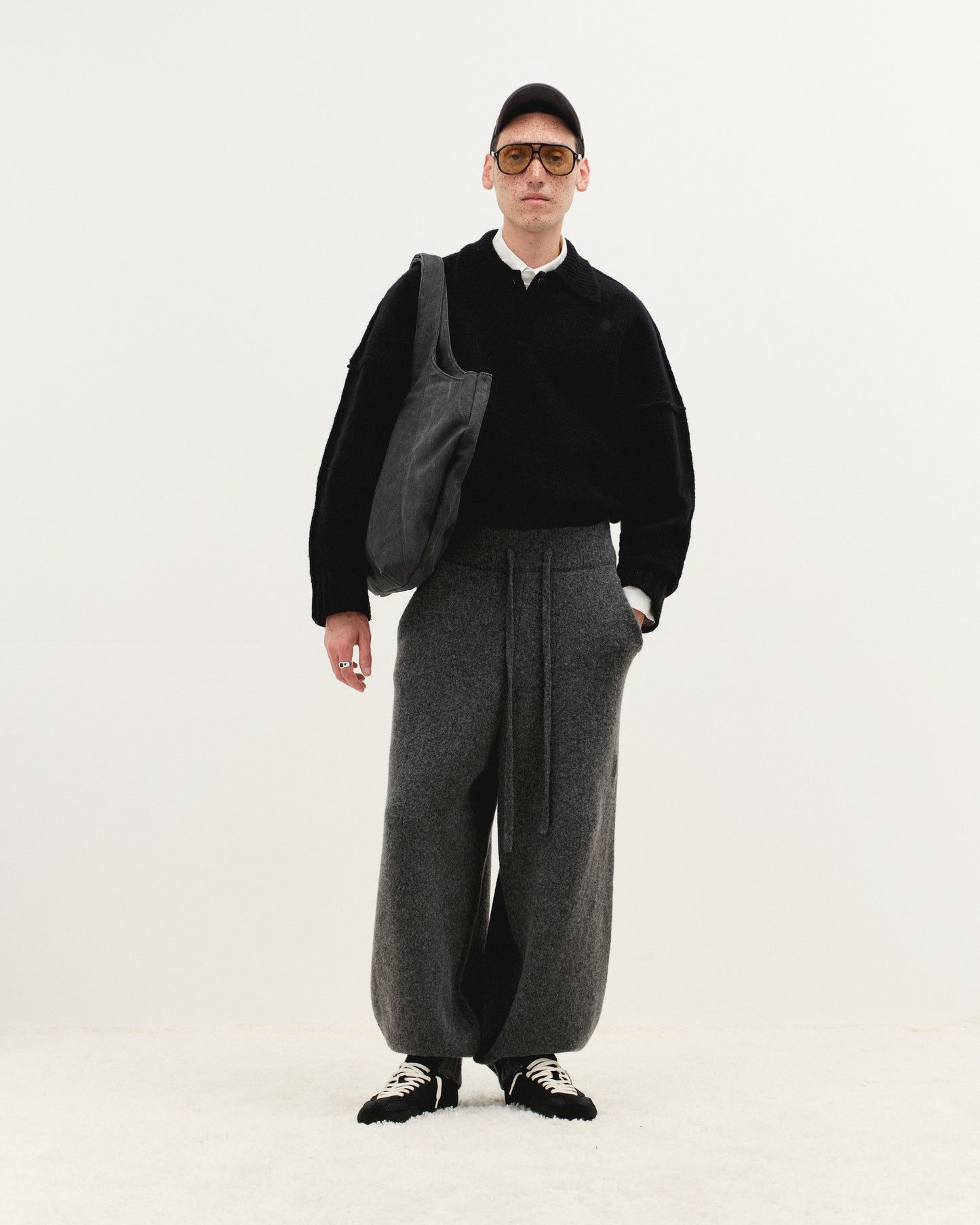 Pantalon en maille de laine à revers en grain de granit