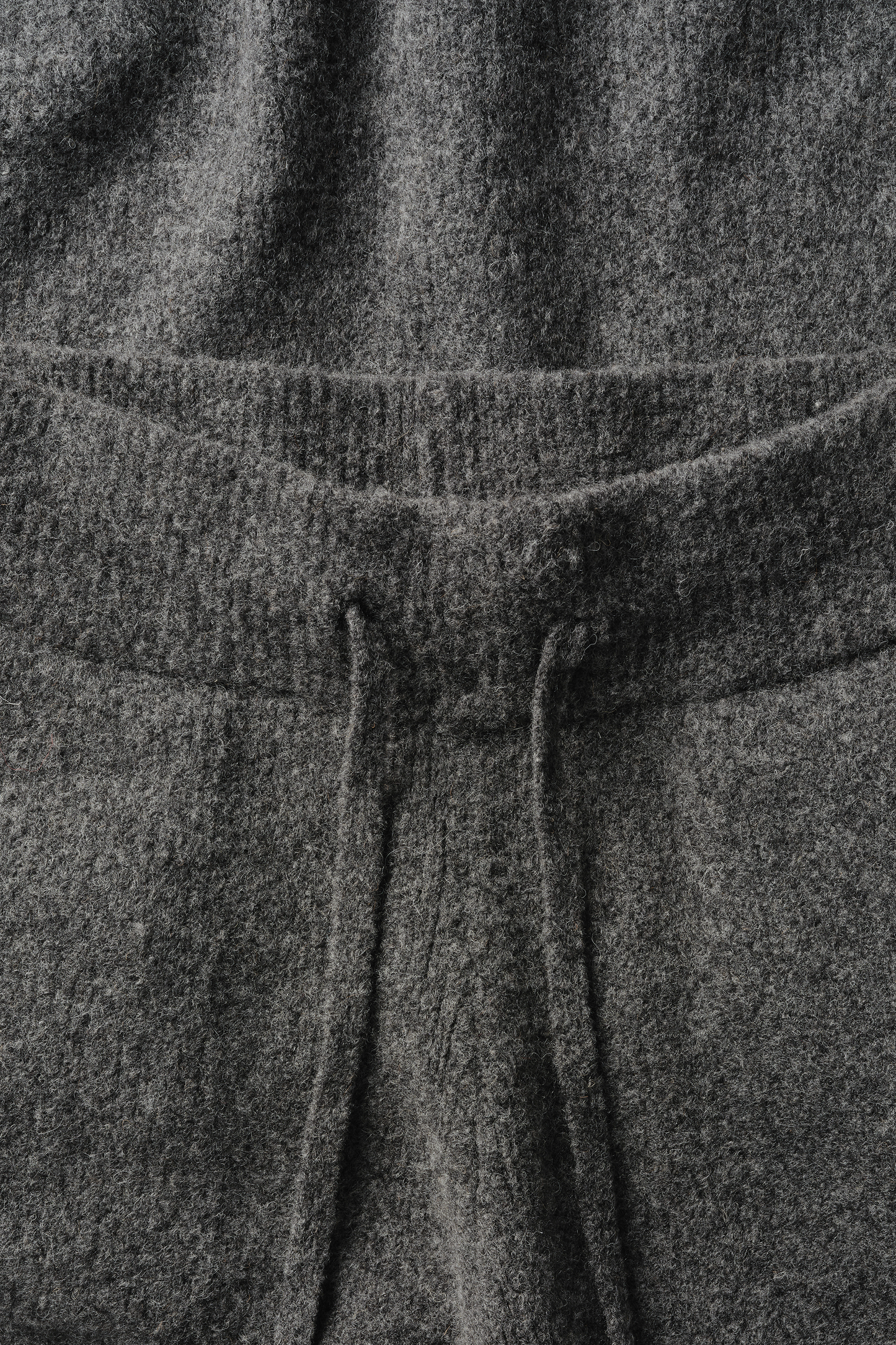 Pantalon en maille de laine à revers en grain de granit